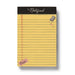 Notepad with yellow lined paper and black top, featuring a small illustration of an eraser.