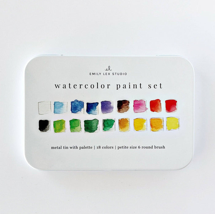 Watercolor paint set with color swatches on a white background