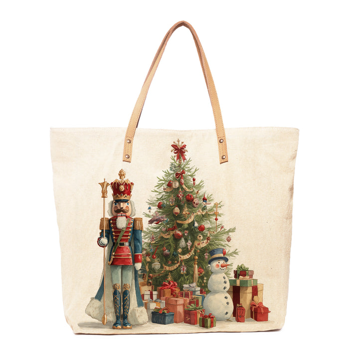 Tote bag with Christmas design featuring a nutcracker, tree, and snowman on a white background