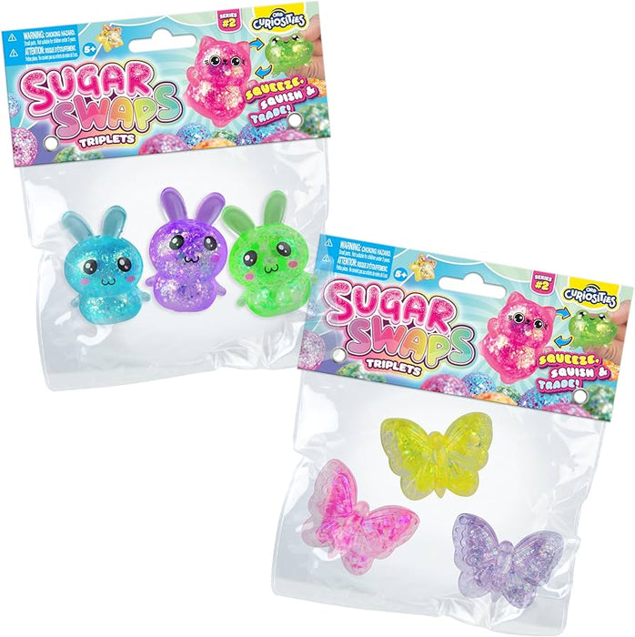 Two packages of Sugar Swaps toys with colorful packaging on a white background