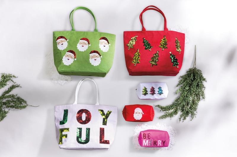 Set of Christmas-themed bags and pouches on a white background with festive decorations.
