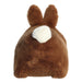 Plush toy resembling a brown animal with a white patch on a white background