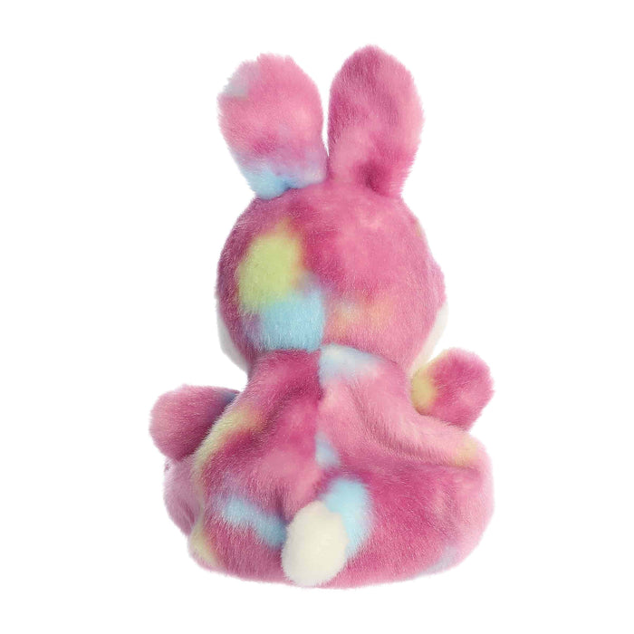 Plush toy with tie-dye pattern on a white background