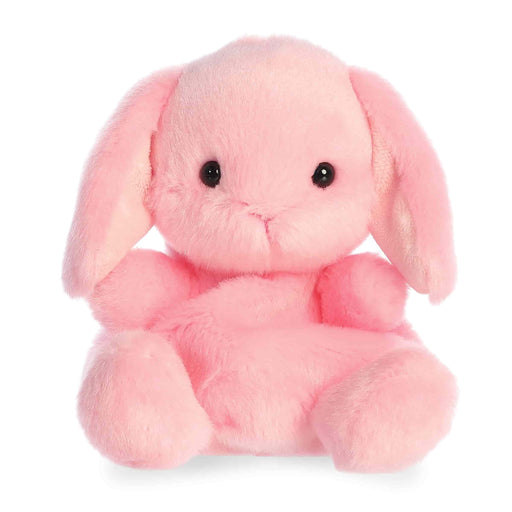 Pink plush bunny toy on a white background