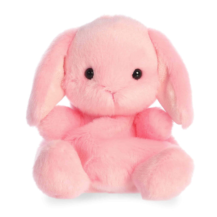 Pink plush bunny toy on a white background