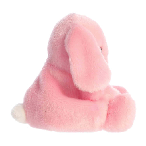 Pink plush toy with long ears on a white background