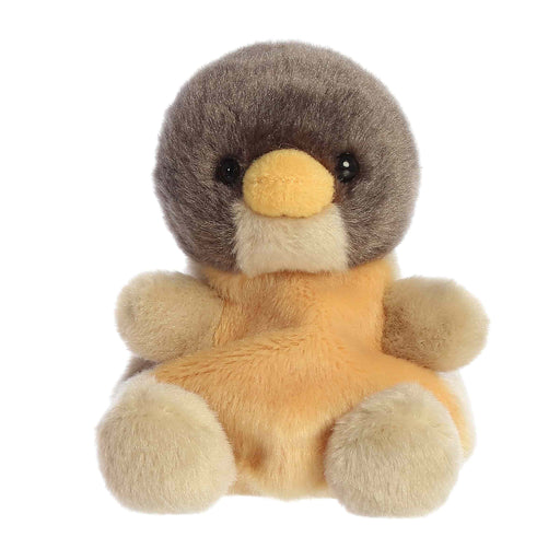 Plush toy penguin with a yellow beak on a white background