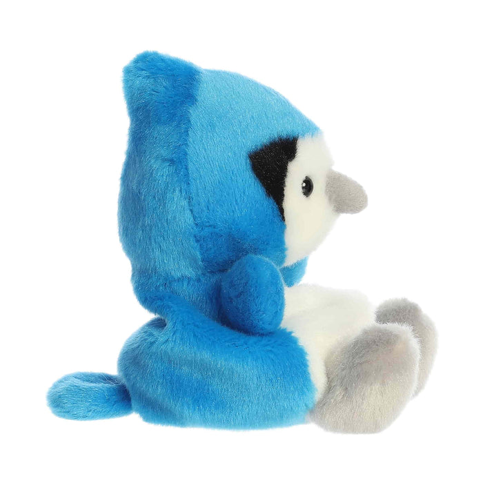 Blue plush toy with a white belly on a white background
