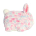 Plush toy with a pastel color pattern on a white background