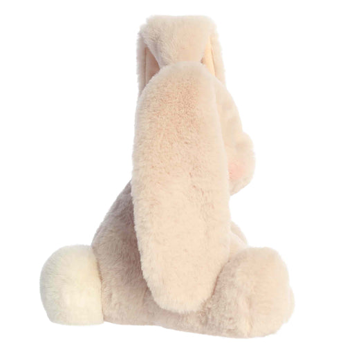 Plush bunny toy with cream-colored fur on a white background