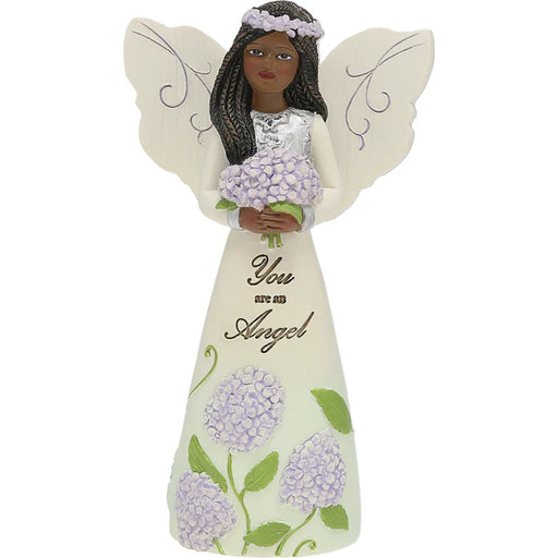 Decorative angel figurine with floral design and text on a white background