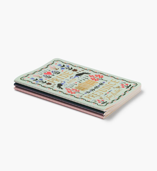 Small notebook with decorative cover on a white background