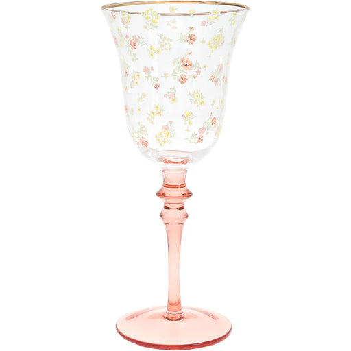 Goblet with floral pattern and pink stem on a white background