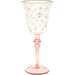 Goblet with floral pattern and pink stem on a white background