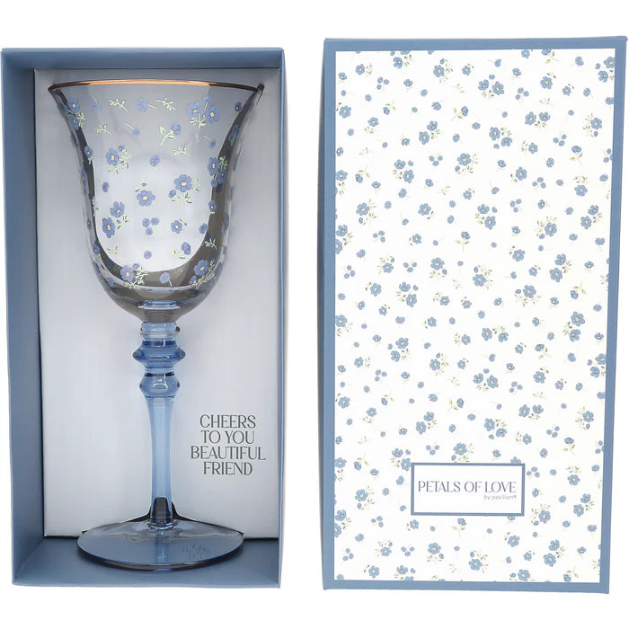 Decorative glass with floral pattern in a matching box, featuring text and brand name.
