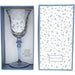 Decorative glass with floral pattern in a matching box, featuring text and brand name.