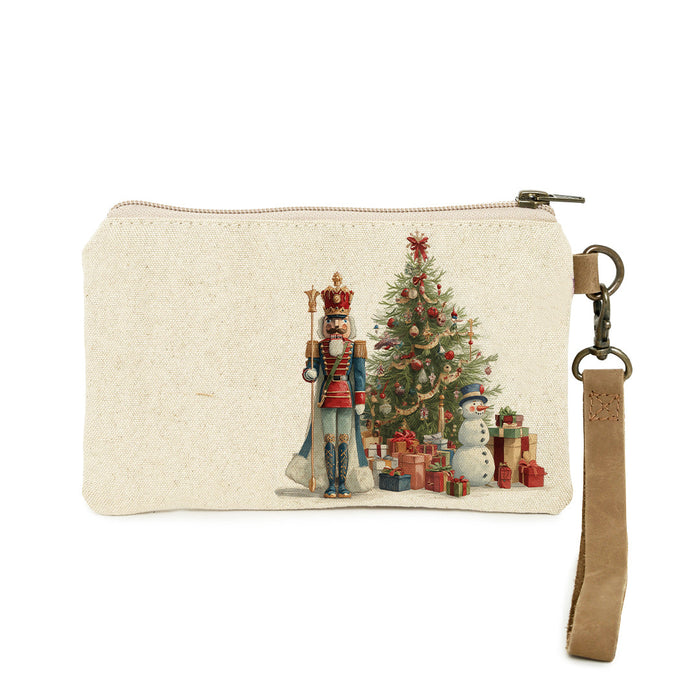 Christmas-themed pouch with nutcracker and tree design on a white background
