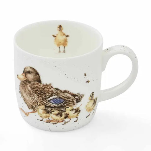 Mug with duck and duckling design on a white background