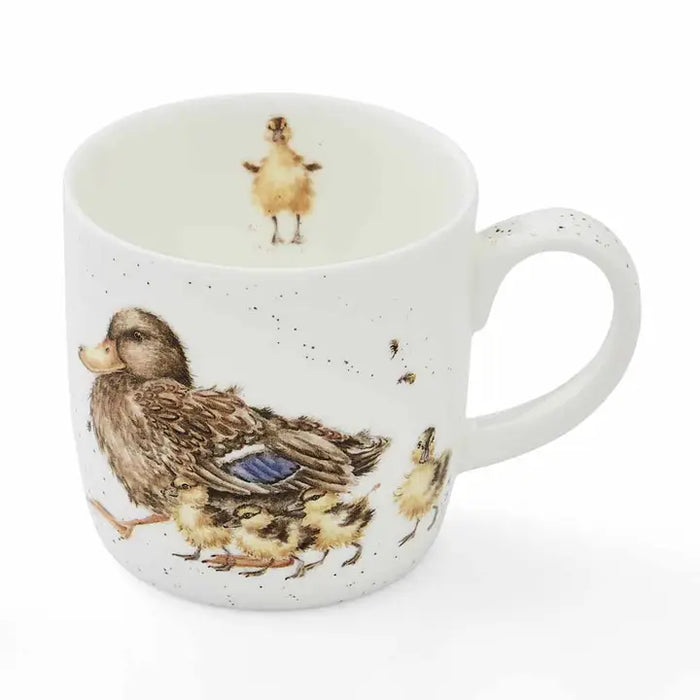 Mug with duck and duckling design on a white background