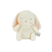 White plush bunny toy with a small tag on a light gray background