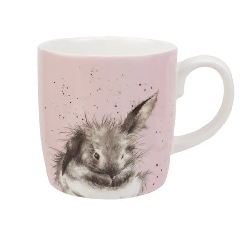 Pink mug with a rabbit design on a white background