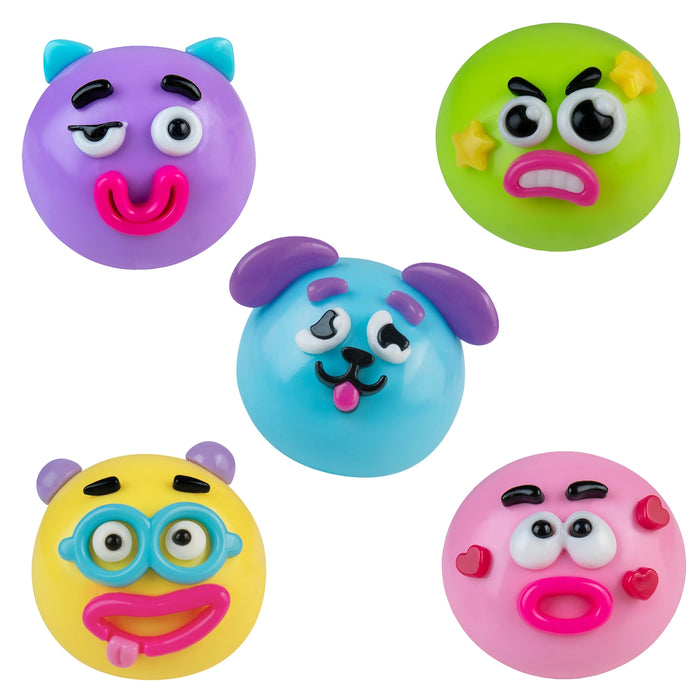 Set of colorful toy faces on a white background