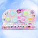 A boxed set of colorful collectible toy capsules and small character pieces from Ellic Feez, displayed on a pastel pink stand against a light blue sparkling background. The packaging shows multiple pastel-colored round capsules and character illustrations.