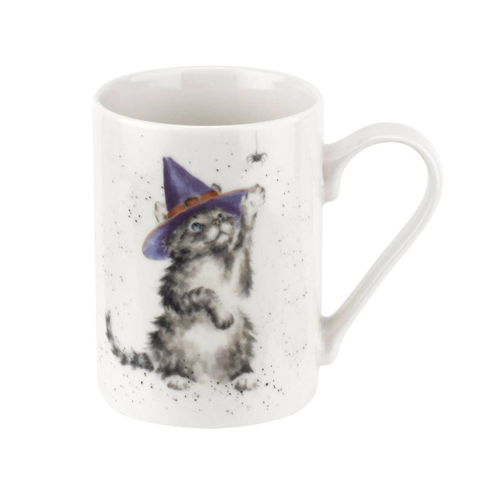 Mug with a design of a cat wearing a witch hat on a white background