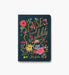 Notebook cover with 'Sense and Sensibility' text and floral design on a white background