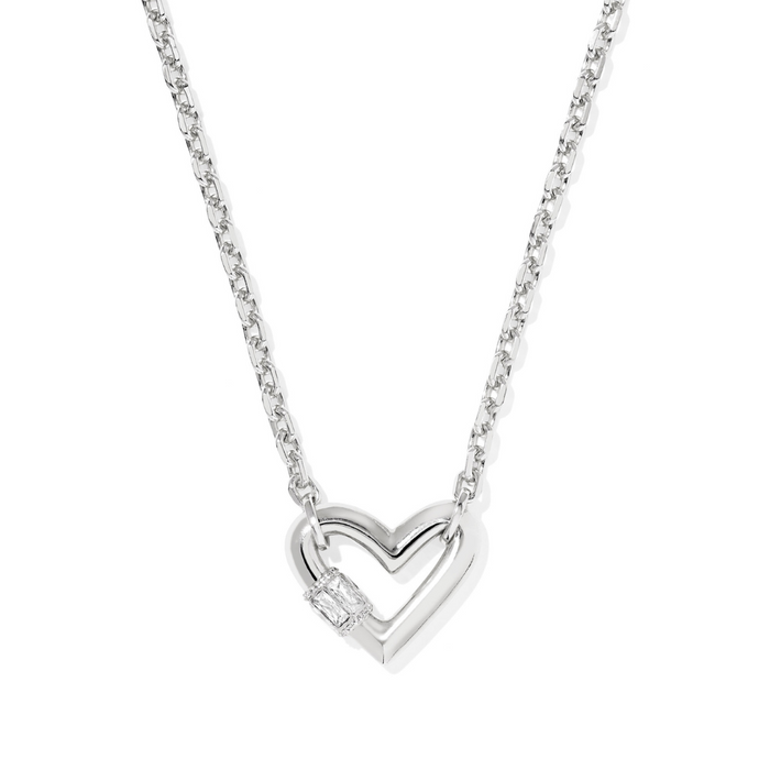 Silver heart-shaped pendant necklace on a white background