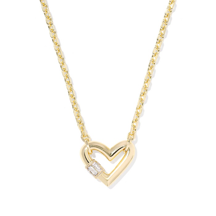 Gold heart-shaped necklace with a small diamond on a white background