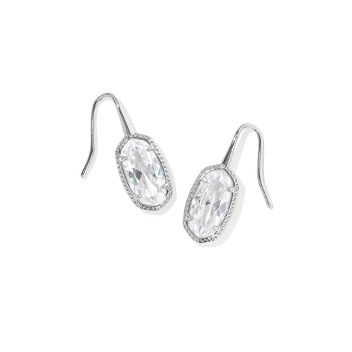 Silver earrings with clear gemstones on a white background