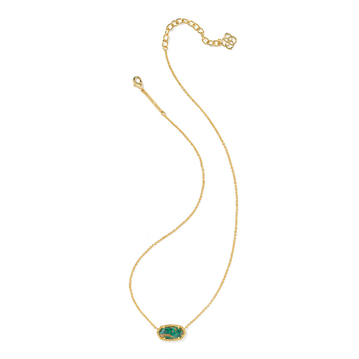Gold necklace with a green pendant on a white background