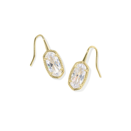 Gold earrings with clear gemstones on a white background