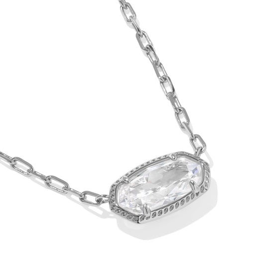Silver necklace with a clear gemstone pendant on a white background