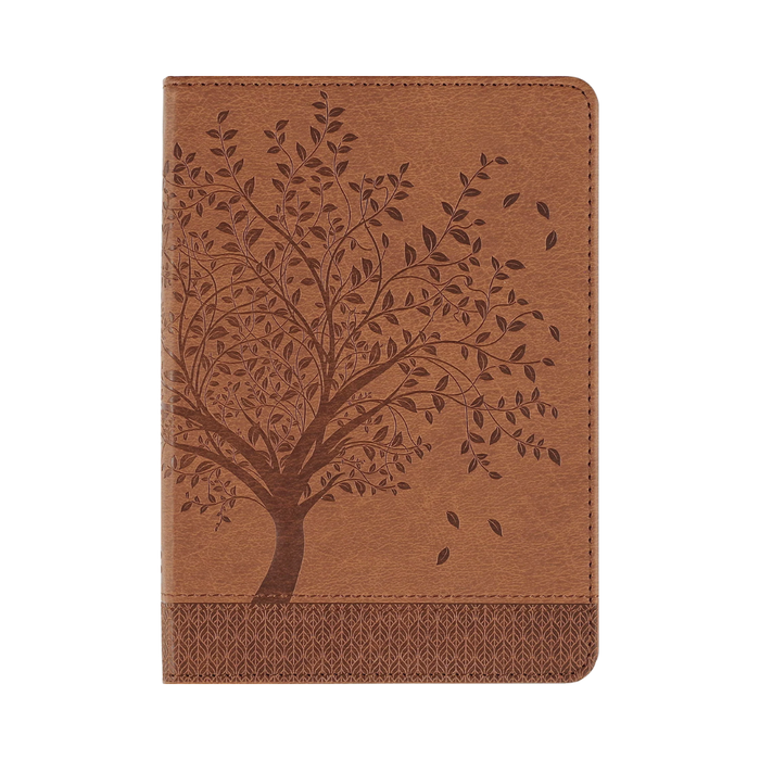 Brown leather notebook with tree design on a white background