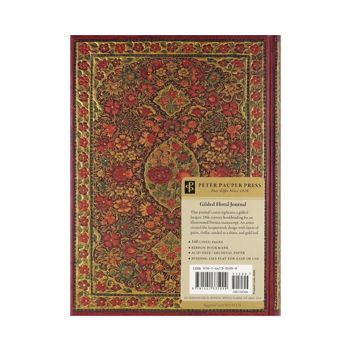 Decorative notebook with floral pattern on a white background