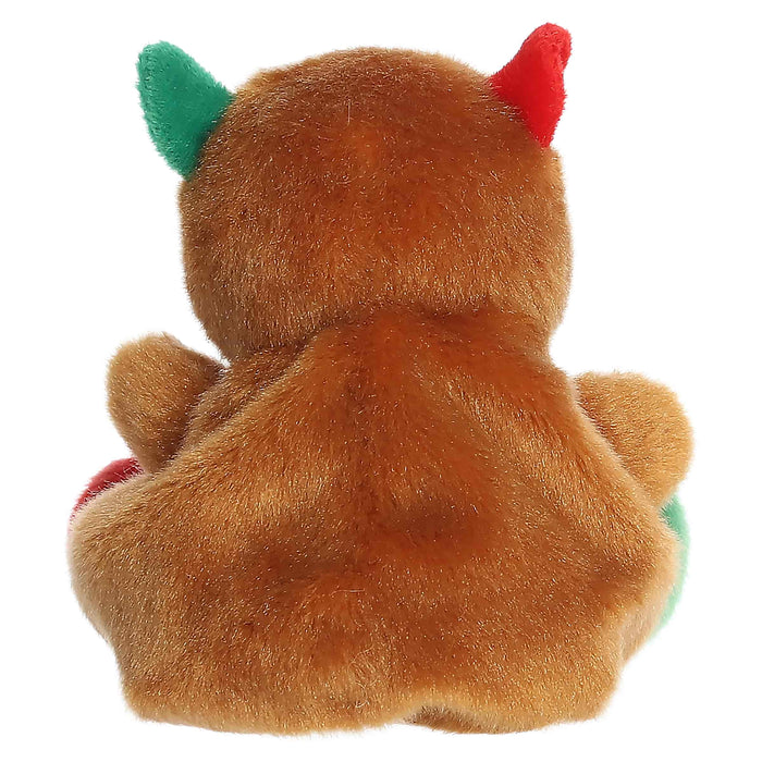 Back view of a plush toy with brown fur, green and red accents on a white background