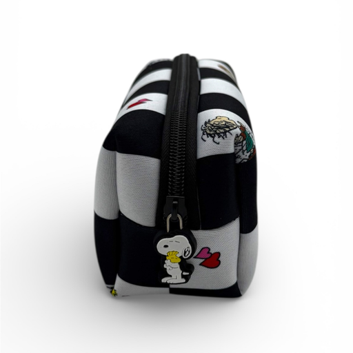 Black and white striped pouch with cartoon character design on a white background