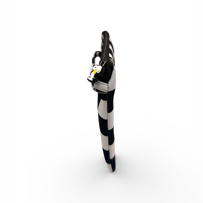 Black and white striped can opener on a white background