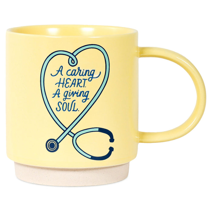 Yellow mug with a stethoscope and text design on a white background