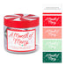 Clear jar with red lid labeled 'A Month of Merry' and matching labels on a white background