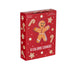 A red rectangular gift box for crew socks, featuring a gingerbread man illustration and the text '0 CALORIE COOKIES' on a plain white background.