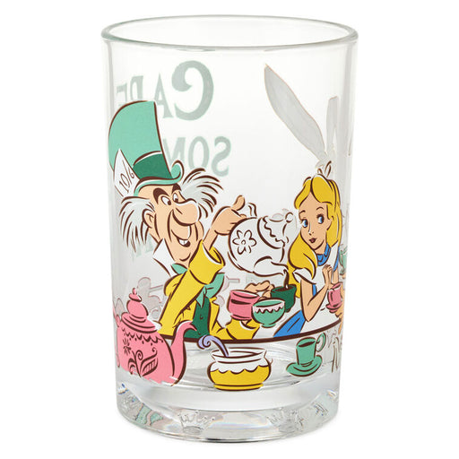 Glass tumbler with Alice in Wonderland design featuring characters and tea party elements.