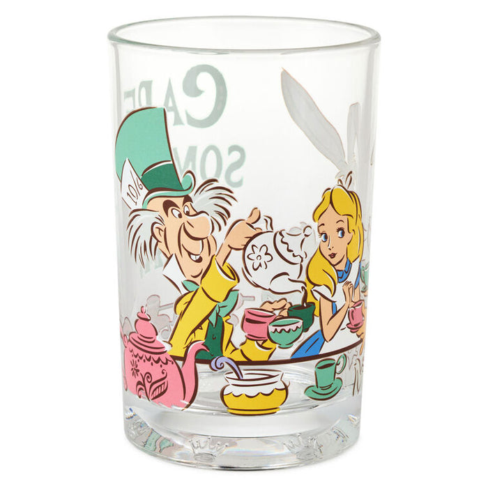 Glass tumbler with Alice in Wonderland design featuring characters and tea party elements.