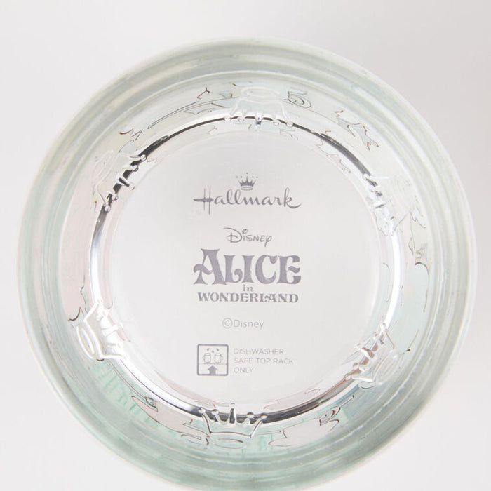 Clear glass plate with 'Hallmark Disney Alice in Wonderland' branding on a white background