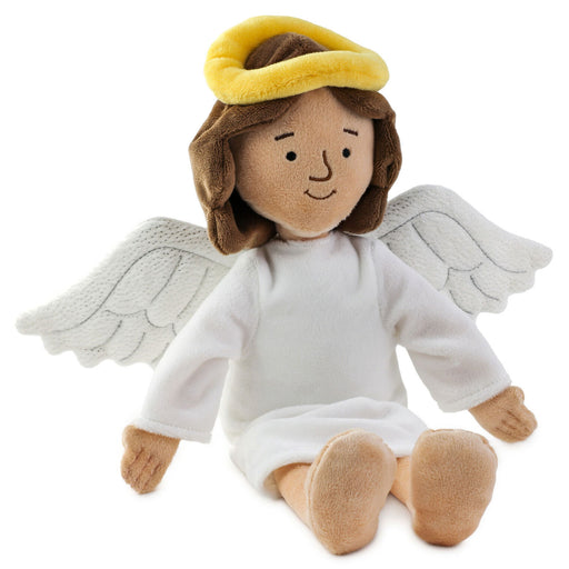 Plush angel toy with brown hair, yellow halo, white robe, and beige shoes on a white background