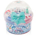 Slime container with toys and a bow on a white background