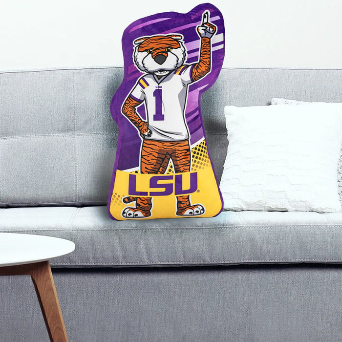 LSU mascot pillow on a gray couch