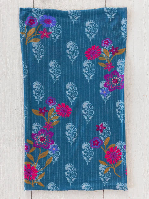 Floral patterned fabric on a wooden surface